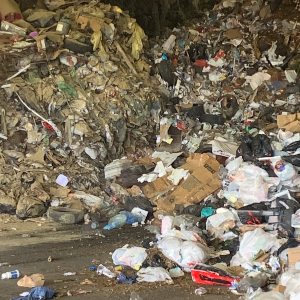 Pile of trash at local landfill - Recyclable items that are throw in the trash.