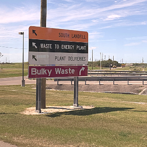 Sign to local landfill - Why you should visit your local dump or solid waste facility.